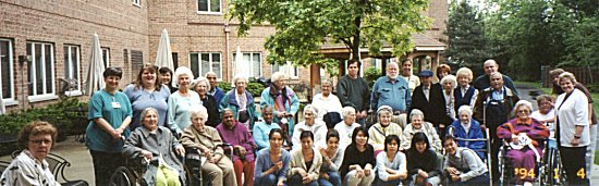 Panorama of volunteers and seniors